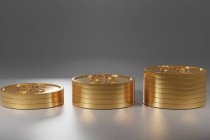国际黄金每盎司价格如何变动？变动的影响因素是什么？